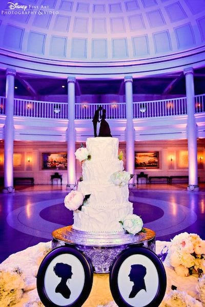 First off, the backdrop of the rotunda inside the American Adventure pavilion in EPCOT is beautiful. The cutout silhouettes on the cake and cake stand are classic and timeless.