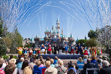 DAZZLING DAY - Mickey Mouse and his friends celebrate the 60th anniversary of Disneyland park during a ceremony at Sleeping Beauty Castle featuring Academy Award-winning composer, Richard Sherman and Broadway actress and singer Ashley Brown, in Anaheim, Calif. on Friday, July 17. Celebrating six decades of magic, the Disneyland Resort Diamond Celebration features three new nighttime spectaculars that immerse guests in the worlds of Disney stories like never before with "Paint the Night," the first all-LED parade at the resort; "Disneyland Forever," a reinvention of classic fireworks that adds projections to pyrotechnics to transform the park experience; and a moving new version of "World of Color" that celebrates Walt Disney's dream for Disneyland. (Paul Hiffmeyer/Disneyland Resort)