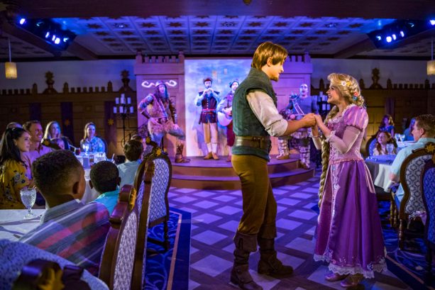 Rapunzel and Flynn Rider dance at Rapunzel's Royal Table restaurant aboard the Disney Magic
