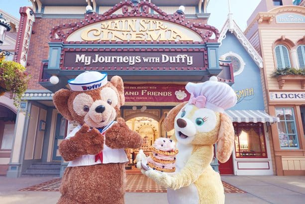 Cookie and Duffy pose outside 'Main Street Cinema: My Journeys with Duffy -- Presented by Fujifilm'