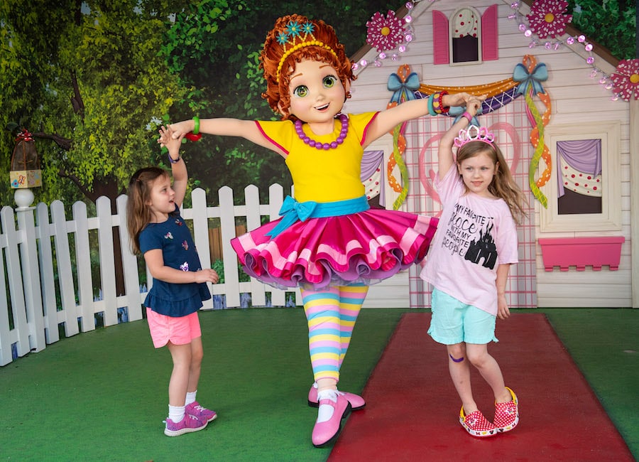 Guests say bonjour to Fancy Nancy at the all-new character greeting location in the Animation Courtyard at Disney's Hollywood Studios