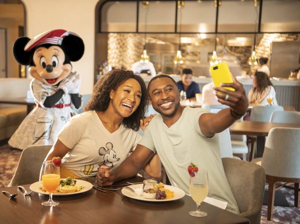 Couple eating breakfast at Disney's Riviera Resort