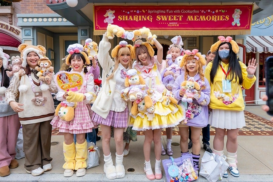 Duffy and Friends fans with outfits and merchandise to match at Hong Kong Disneyland