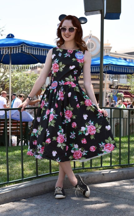 Floral dress near umbrellas