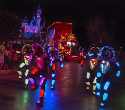 MACK AND THE CARS CREW 'PAINT THE NIGHT' (ANAHEIM, Calif.) — Mack from the Disney●Pixar 'Cars' films appears with the Cars Crew in synchronized, LED costumes in the all-new after-dark spectacular at Disneyland park inspired by the iconic 'Main Street Electrical Parade.' 'Paint the Night' is full of vibrant color and more than 1.5 million, brilliant LED lights and features special effects, unforgettable music, and energetic performances that bring beloved Disney and Disney●Pixar stories to life. (Paul HIffmeyer/Disneyland Resort)