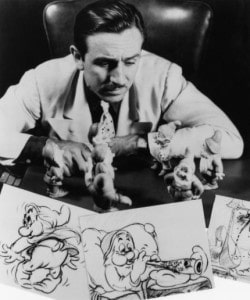 SNOW WHITE AND THE SEVEN DWARFS producer Walt Disney with models and sketches 1937