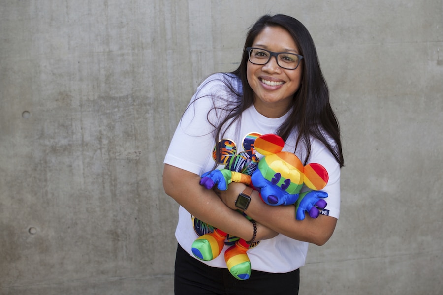 Girl with Rainbow Mickey Plush