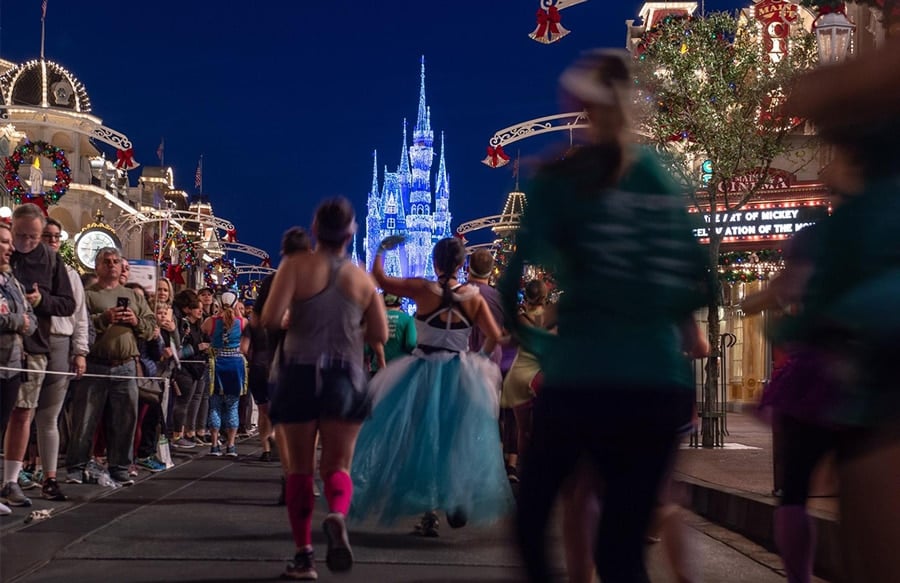 Runner and Cinderella Castle at Walt Disney World Marathon Weekend