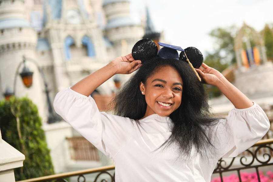 | The Main Street Mouse Graduate on a Capture Your Moment Session from Disney Photopass