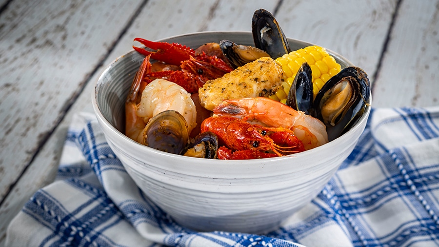 Offerings from Hops & Barley Marketplace for the 2020 Epcot Taste of International Food & Wine Festival - Southern Seafood Boil: Shrimp, Mussels, Crawfish, Potatoes, Corn, and Andouille Sausage