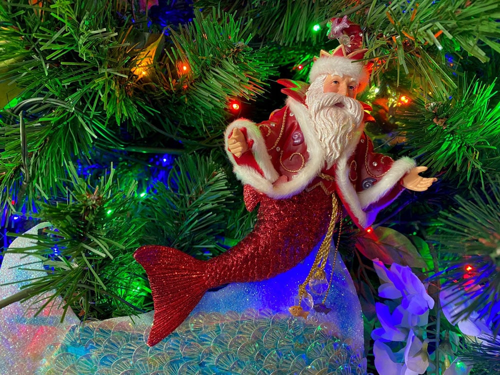Santa Claus merman ornament on the Christmas tree in the lobby of Disneys Old Key West Resort