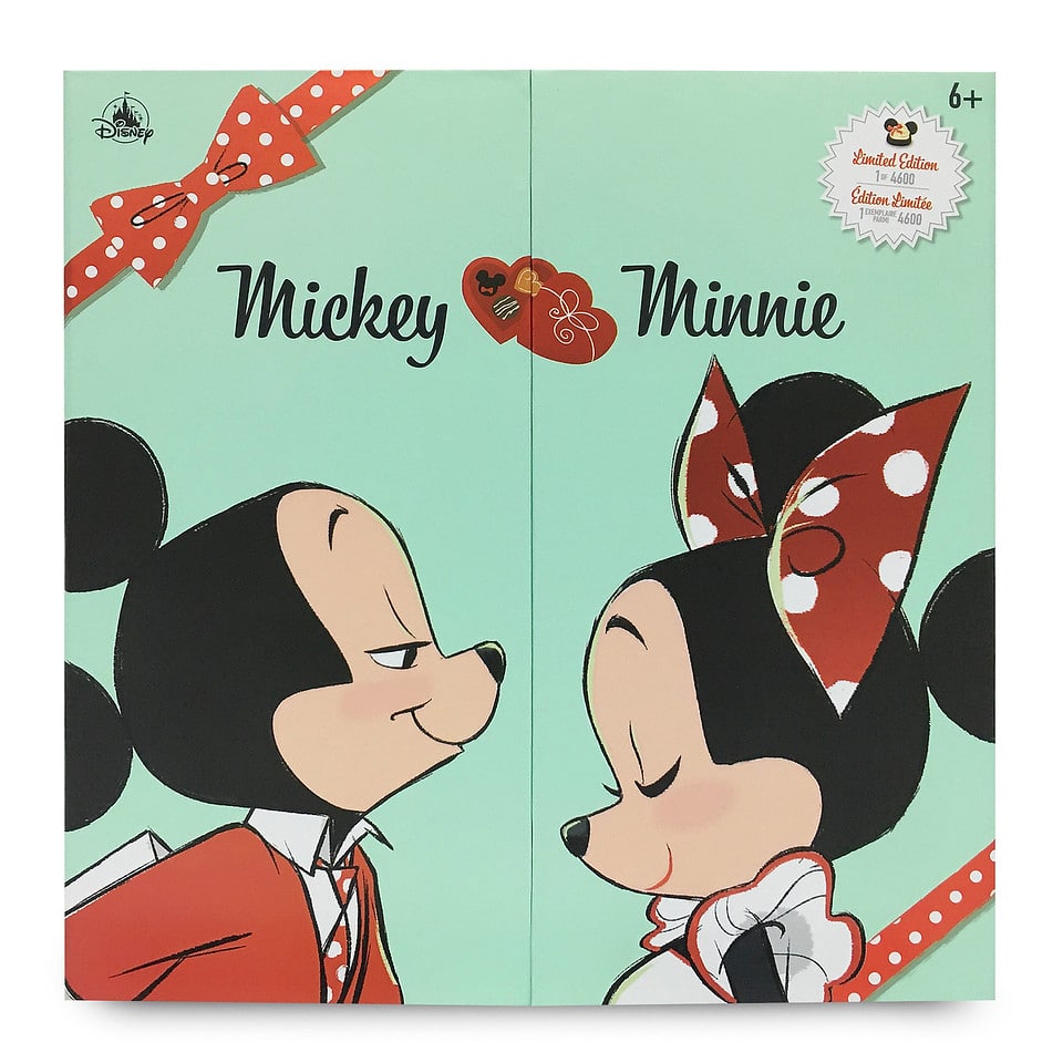 Limited edition Mickey Mouse and Minnie Mouse doll set display case with hinged front panels decorated with confectionary