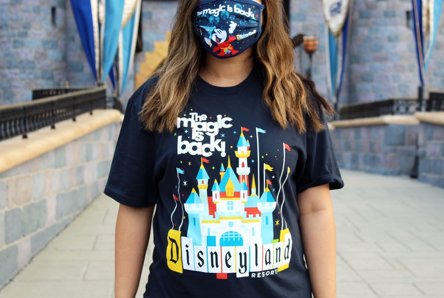 The Magic Is Back Merchandise Collection at Disneyland Resort t shirt and face mask