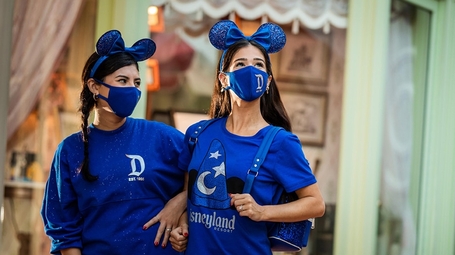 Guests in Disneyland Resort merchandise