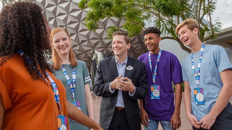 Students talking with a Disney leader at EPCOT