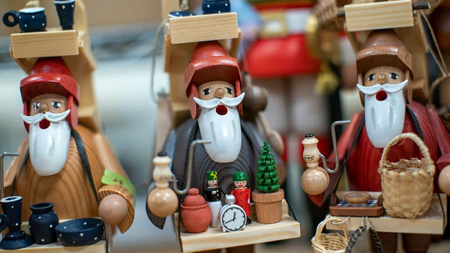 assortment of painted wooden holiday decor