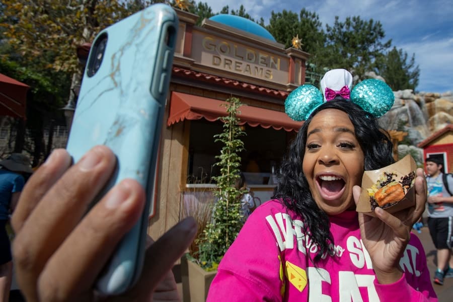 Guest enjoying Disney California Adventure Food Wine Festival