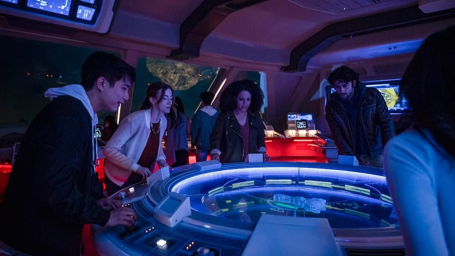 Passengers learn the systems of the Halcyon starcruiser from the ships Bridge in Star Wars Galactic Starcruiser at Walt Disney World Resort