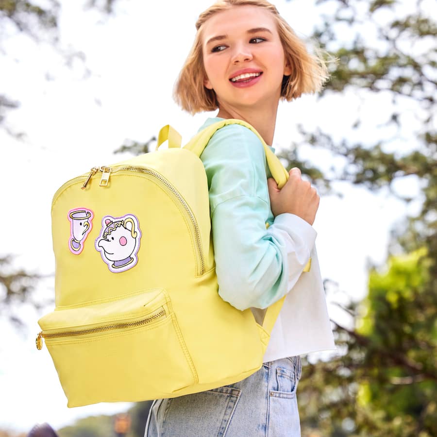 Pre sewn patches on yellow backpack