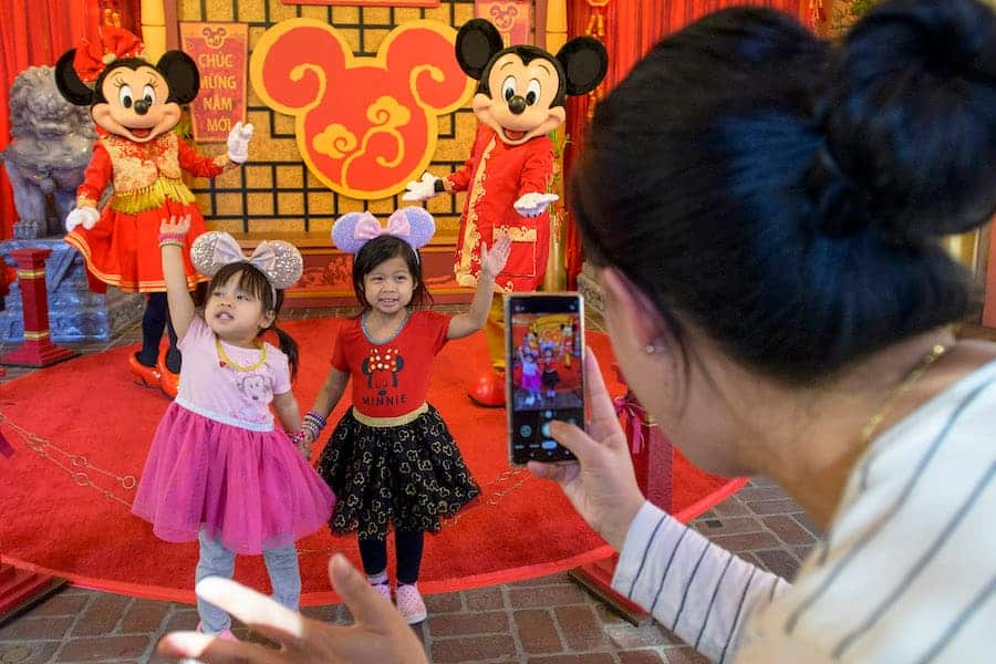 Girls at the Lunar New Year celebration at Disney California Adventure Park
