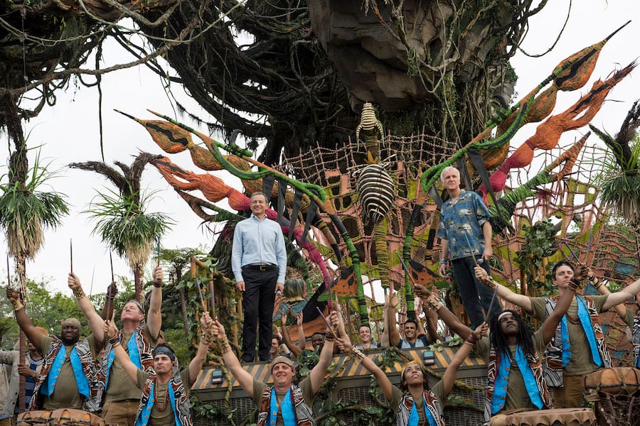 Bob Iger and James Cameron, flanked by performers, dedicate Pandora – The World of Avatar.