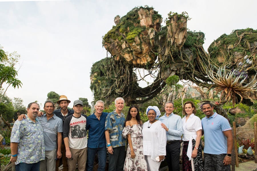 "Avatar" cast join Jon Landeau, James Cameron and Disney CEO Bob Iger for a photo.