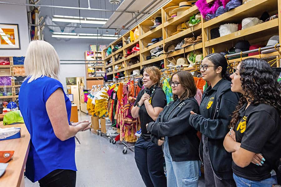 Disney Cast Member Teaching Florida Theater Students about Costuming