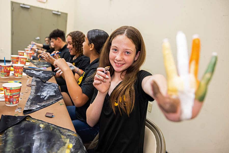 Florida Theater Students Trying Out Costuming Techniques