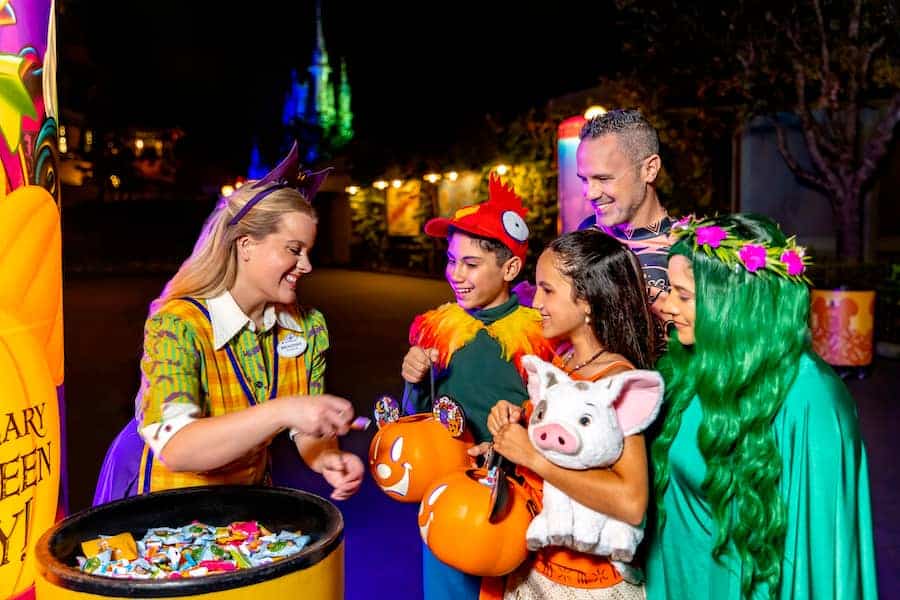 Guests getting candy during Mickey’s Not-So-Scary Halloween Party