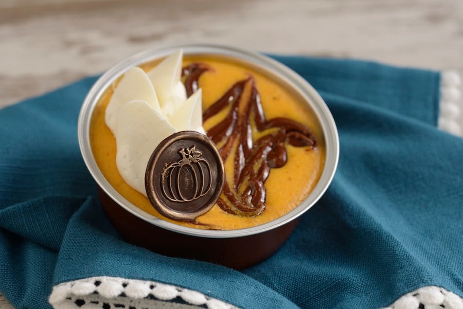 Pumpkin-Hazelnut-Chocolate Swirl Cheesecake: Pumpkin cheesecake with hazelnut-chocolate swirl, vanilla whipped panna cotta, and a milk chocolate pumpkin coin - Primo Piatto in Disney’s Riviera Resort (Available Sept. 1 through Nov. 24; mobile order available)