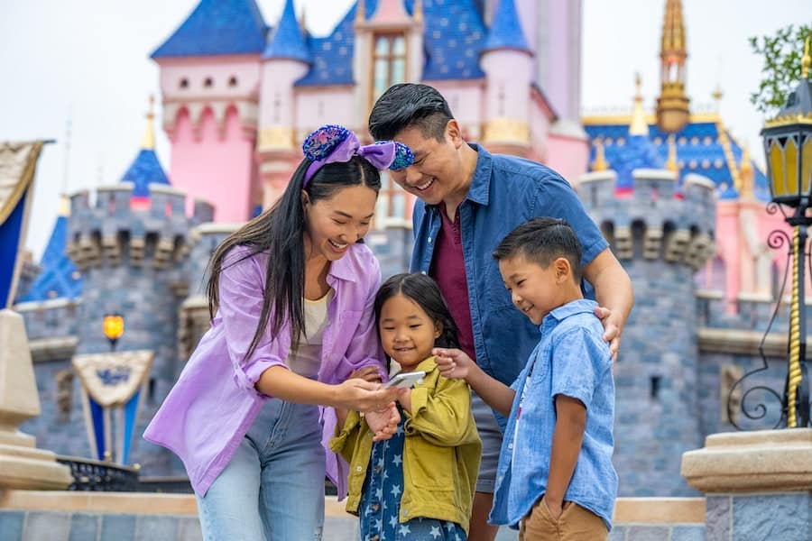 Guests enjoying Disney Genie+ at Disneyland Park
