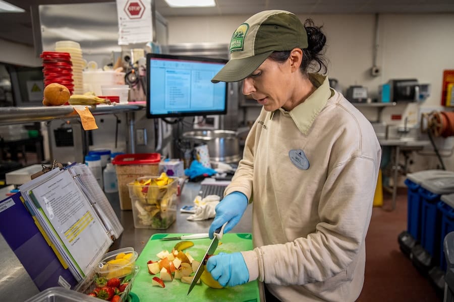 Disney animal nutritionist preparing meals for animals at Disney World