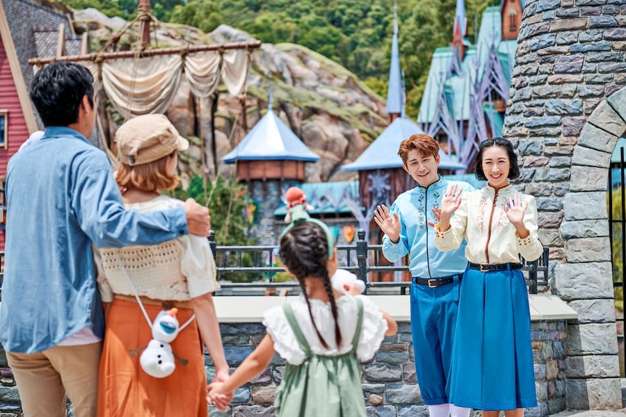 Family at World of Frozen at Hong Kong Disneyland opening Nov 20