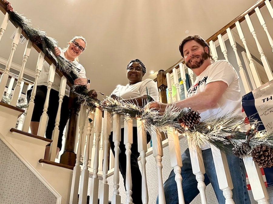 Disney SALUTE VoluntEARS decorate staircase