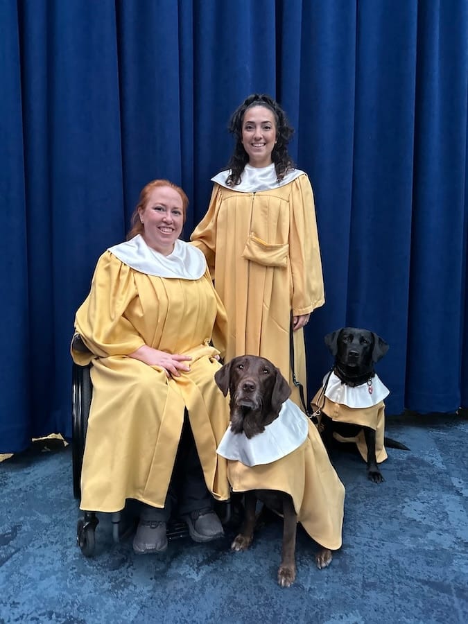 Cast members Erin Quintanilla, Blossom, Kayla Cortez and Briar Rose in their gold choir robes for the annual Disneyland Resort Candlelight Ceremony