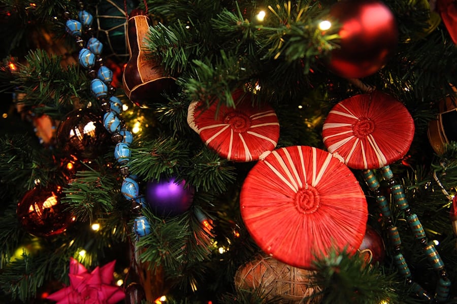 A clever Mickey-shaped ornament on a Disney Christmas tree