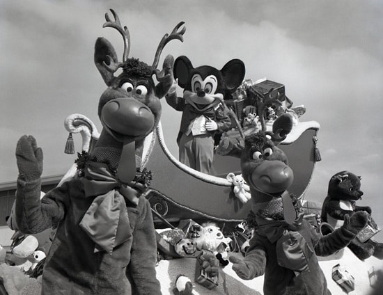 Mickey Mouse on a sleigh surrounded by reindeer at Walt Disney World in 1972