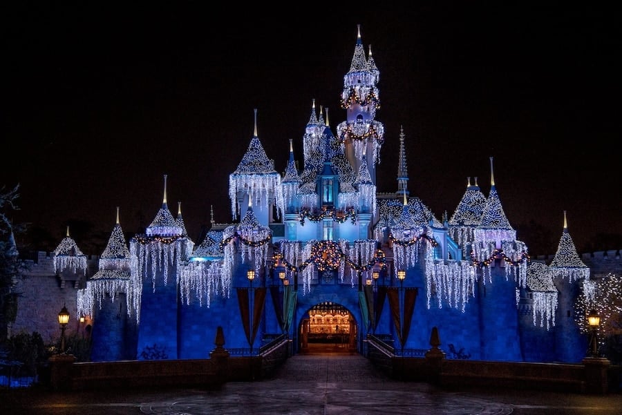 Sleeping Beauty Castle decorated in holiday lights, 2024 Disneyland Resort Event