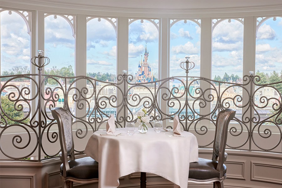 Dining in the newly reopened Disneyland Hotel in Paris with a view of Sleeping Beauty Castle