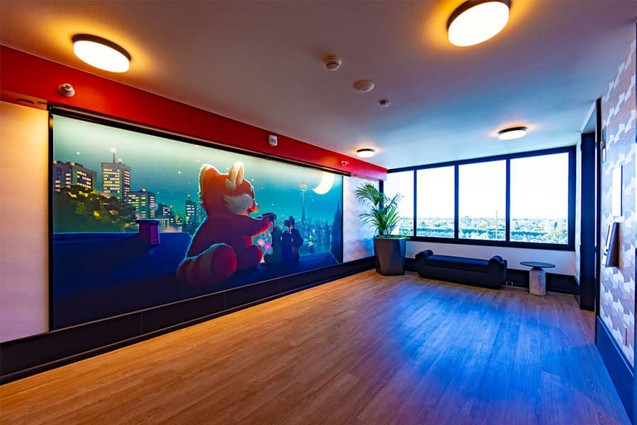 Pixar Place Hotel at Disneyland Resort Elevator Mural At Pixar Place Hotel at Disneyland Resort in Anaheim Calif each floor of the 15 story hotel displays a mural outside of the elevator banks giving an homage to different Pixar films from Turning Red to Monsters Inc Christian ThompsonDisneyland Resort