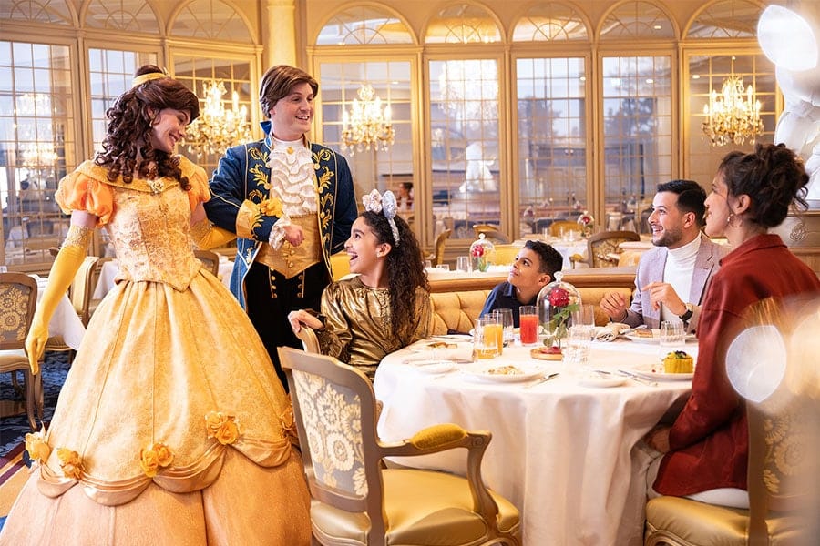 Family seeing Belle during a meal at the Disneyland Hotel at Disneyland Paris
