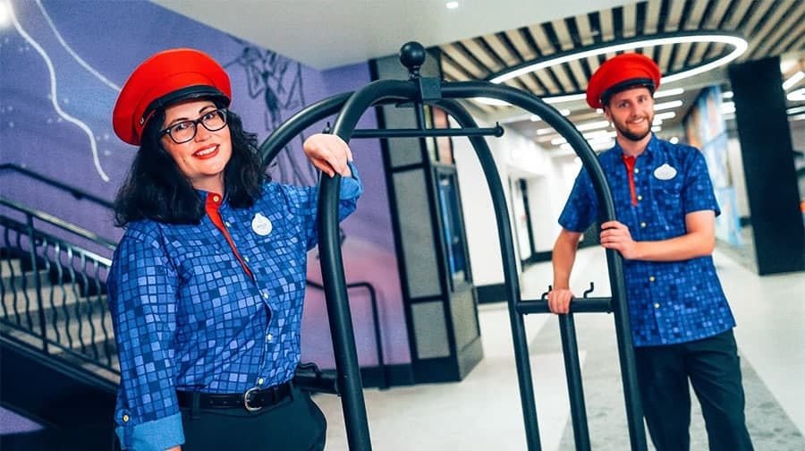 | The Main Street Mouse Bell Service Cast Members in New Costumes at the New Pixar Place Hotel at Disneyland Resort