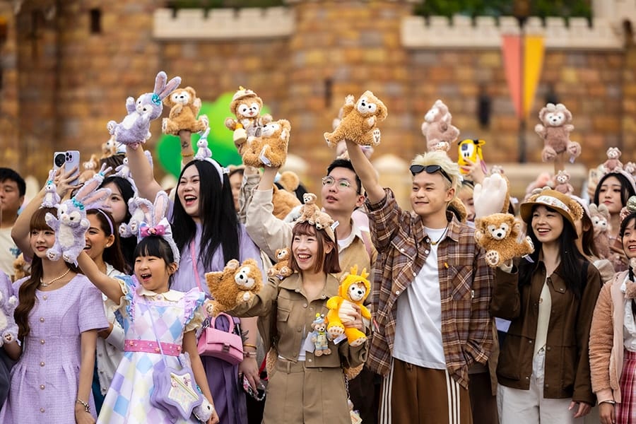 Duffy and Friends fans with outfits and merchandise to match at Hong Kong Disneyland