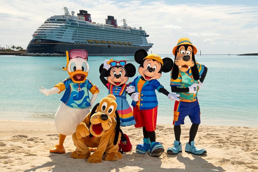 Image of Donald Duck, Mickey Mouse, Minnie Mouse, Goofy and Pluto on Castaway Cay in their new beach outfits - Disney Cruise Line