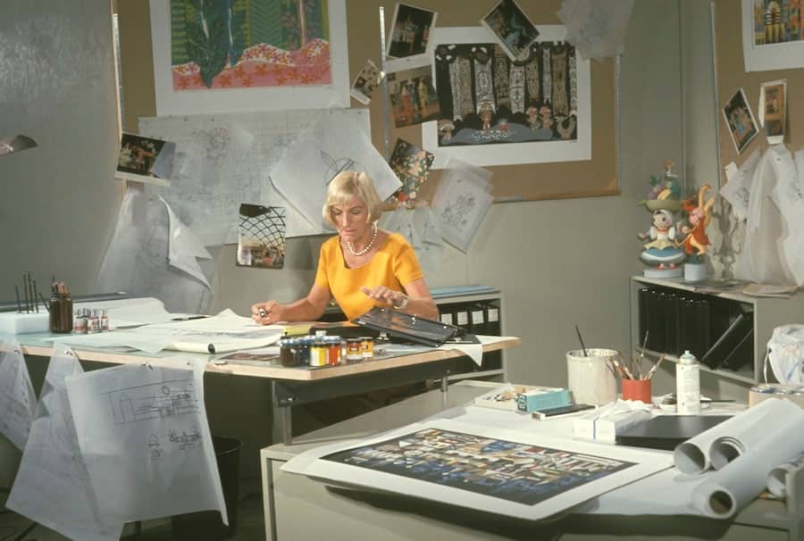 Mary Blair working at desk