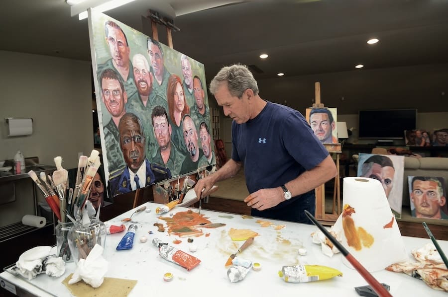 President George W. Bush working on his painting collection that is now known as the “Portraits of Courage: A Commander’s Tribute to America’s Warriors”