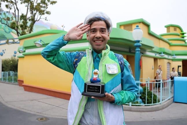 | The Main Street Mouse a Cast Member Smiles with His most Like Donald Duck Prize