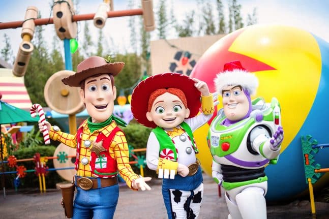 Woody Jessie and Buzz in holiday attire at Disney's Hollywood Studios