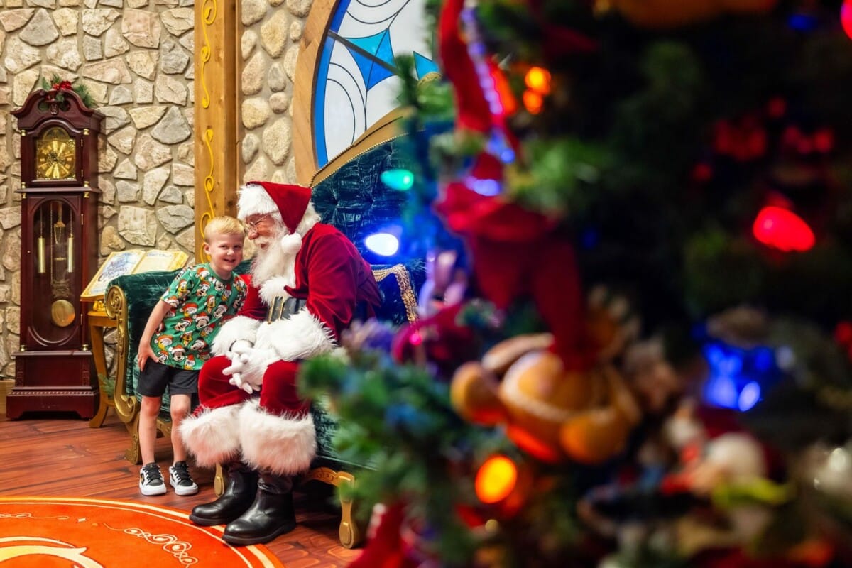 Guest meeting Santa Claus at Santas Marketplace at Disney Springs
