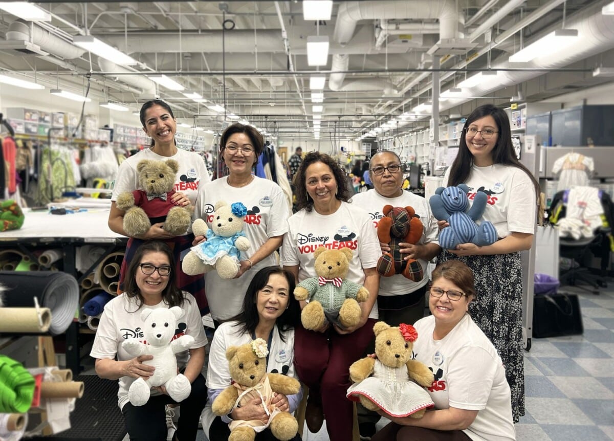 Disney VoluntEARS pose with their bears ready to donate to the Disney Ultimate Toy Drive